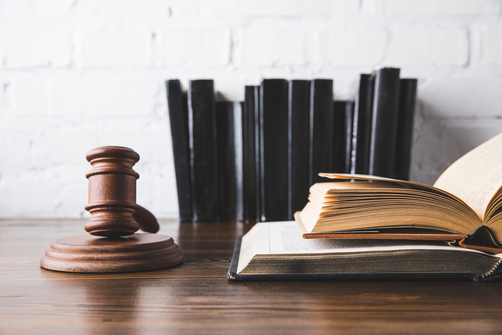 lawyer desk with gavel and law books