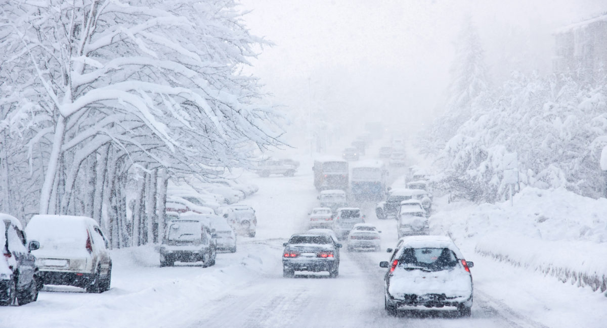 Bad Weather Driving: Risks & Safety - Snowstorm, poor visibility, slick roads and lots of traffic