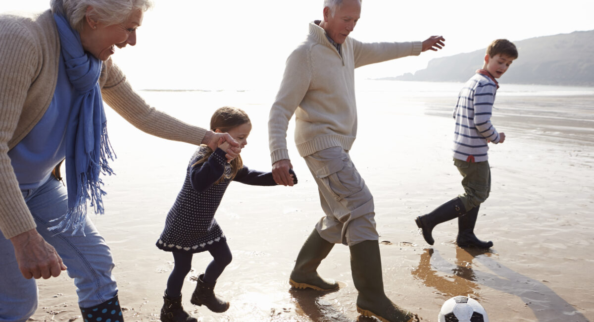 elder law lawyer with grandparents playing with grandchildren